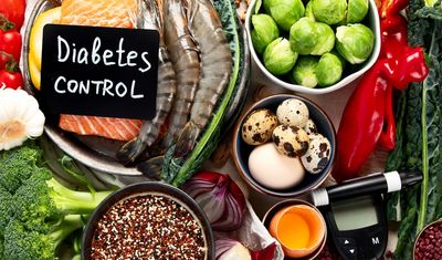 Healthy foods and glucose meter representing diabetes management